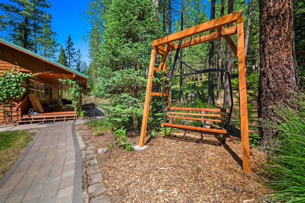 Enjoy swinging on a ski lift chair while watching your kids or dogs play in the grass.
