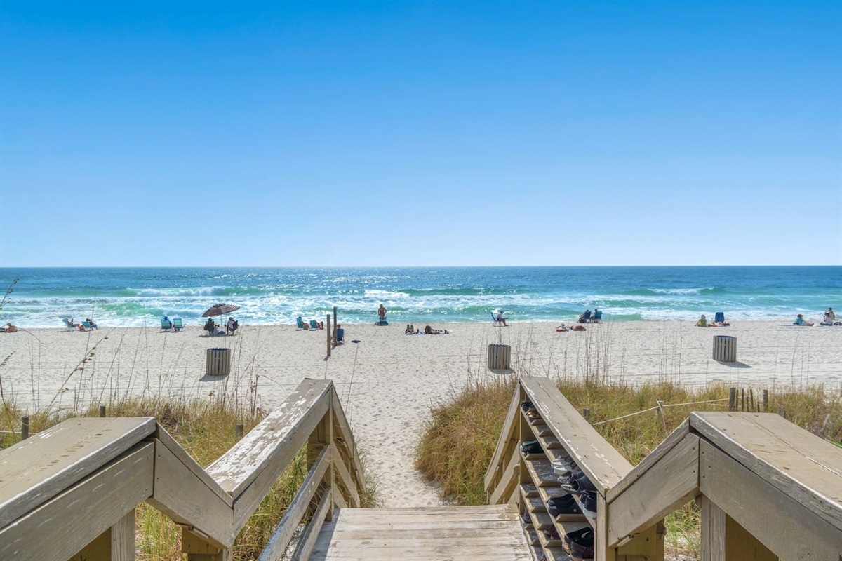 Step out of the condo and onto the sugar-white sands of Panama City Beach—your beachfront escape begins just down this private boardwalk!