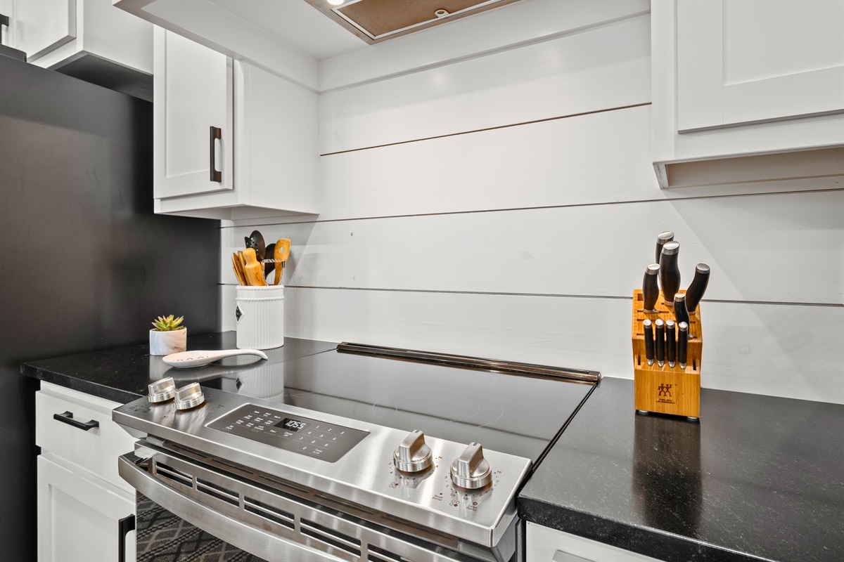 Sleek appliances and generous counter space give you plenty of room to prep, serve, and enjoy meals together.
