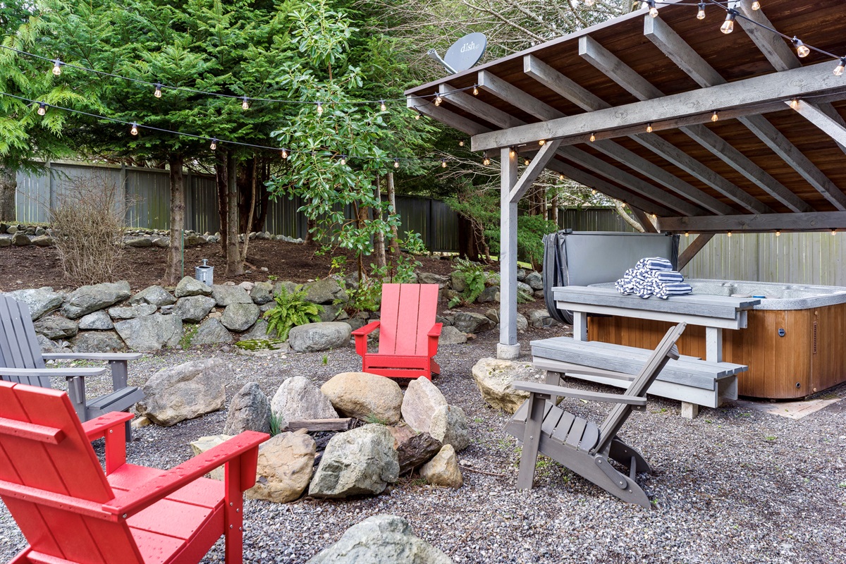 Cozy up around the firepit and enjoy your favorite beverage after a nice relaxing soak in the hot tub. 