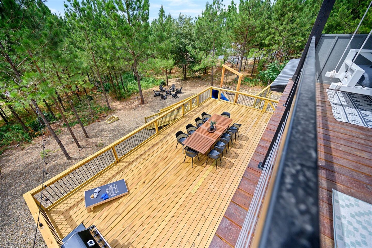 Large deck with dining for 10, BBQ and cornhole.