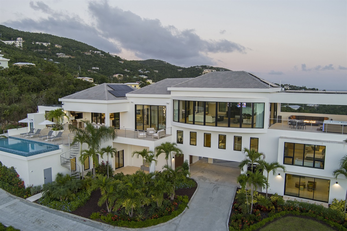 (Left to right upper level) Pool deck, main level primary, outdoor dining, kitchen, indoor dining, living room, jacuzzi deck (Left to right middle) bedrooms 3, 4, and second primary (Left to right lower) spiral staircase, arcade, gym, garage, bunk bedroom 