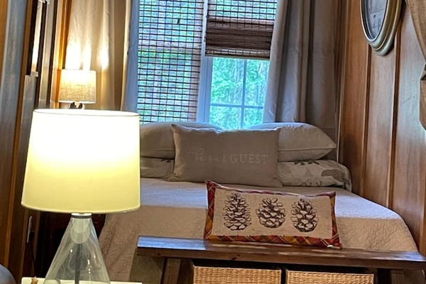 Sleep well in our comfy bedroom alcove complete with memory foam full bed, blackout curtains, and ceiling fan!