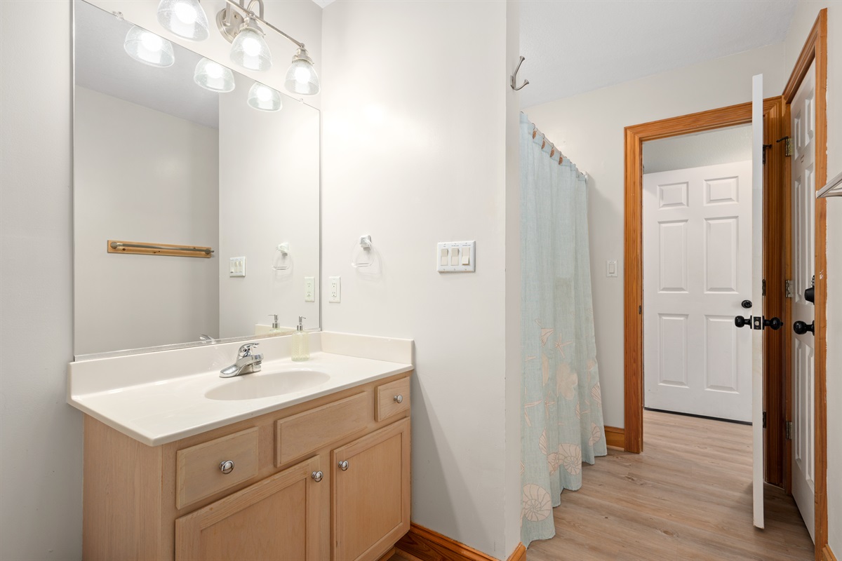 Attached full bathroom offering added privacy and convenience.