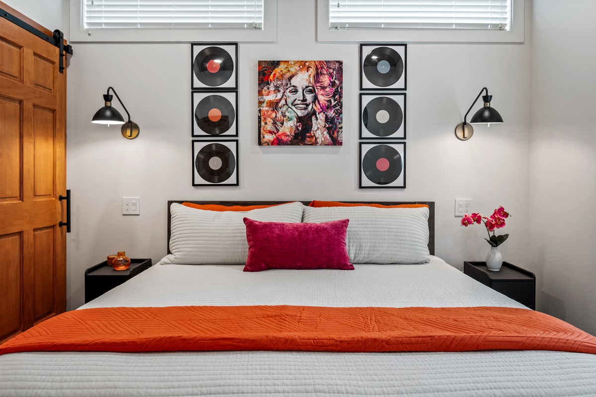 Relax in this main floor King Bedroom, convenient with the bathroom right outside the door and steps from the kitchen.