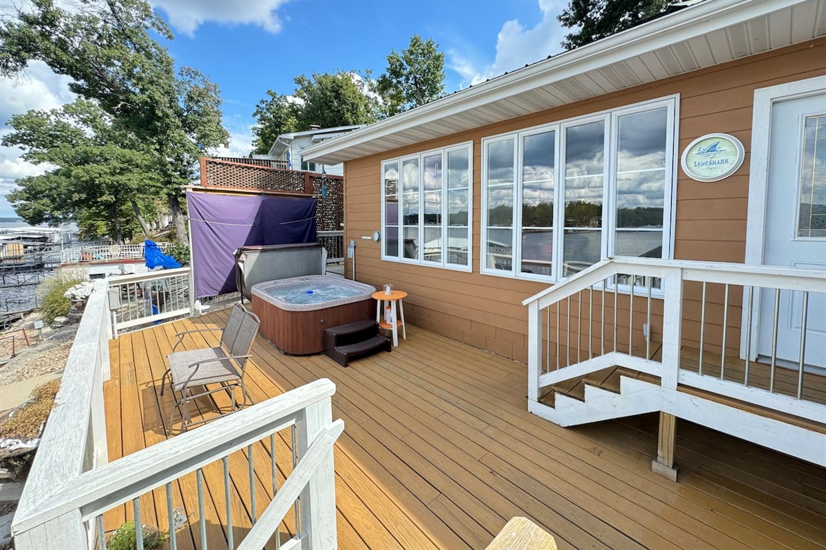 Spacious deck for viewing the lake and enjoying the hot tub. 
