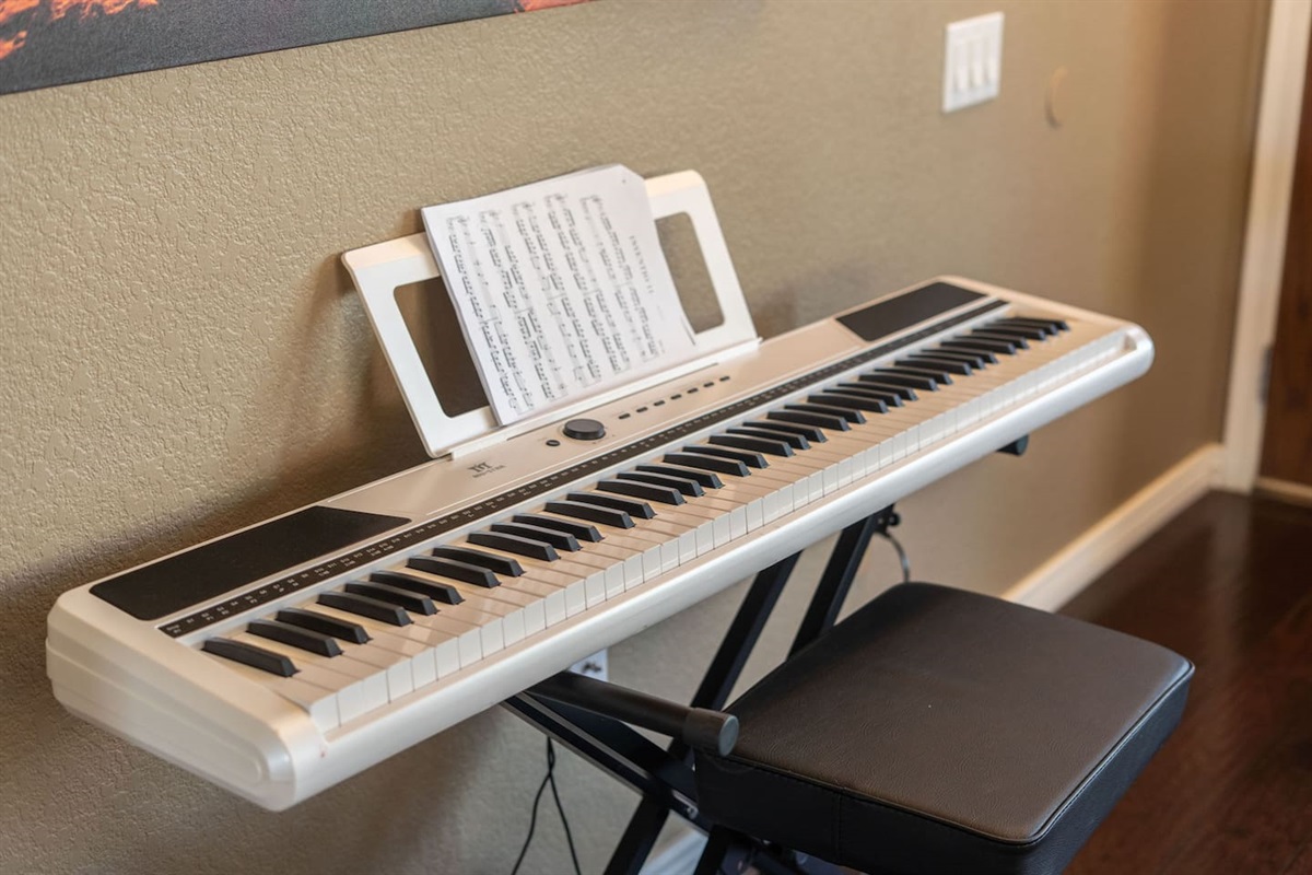 A full-size digital keyboard with sheet music stand awaits any musician in your group — a fun and unexpected amenity to enjoy during your stay.