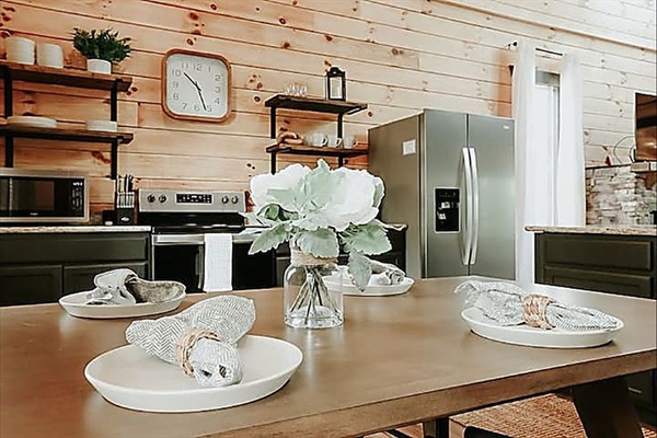 A welcoming dining space styled with thoughtful touches—perfect for lingering meals, shared stories, and slow mountain mornings