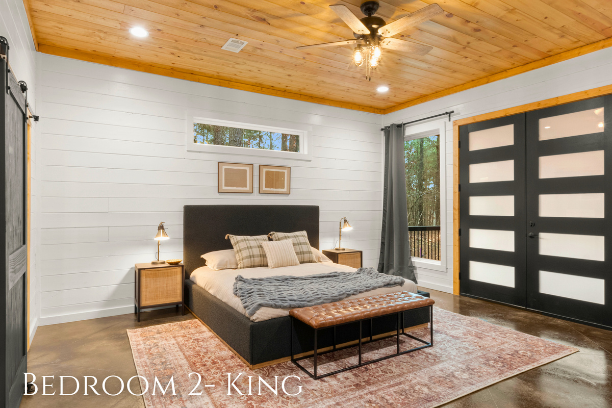 Large sliding doors offer ample natural light and easy access to the outdoor spaces!