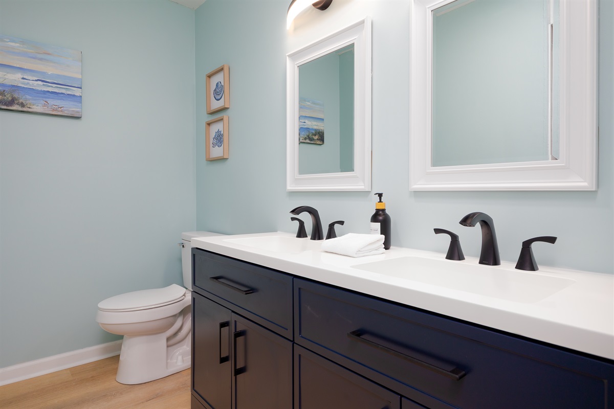 Hallway bathroom with vanity