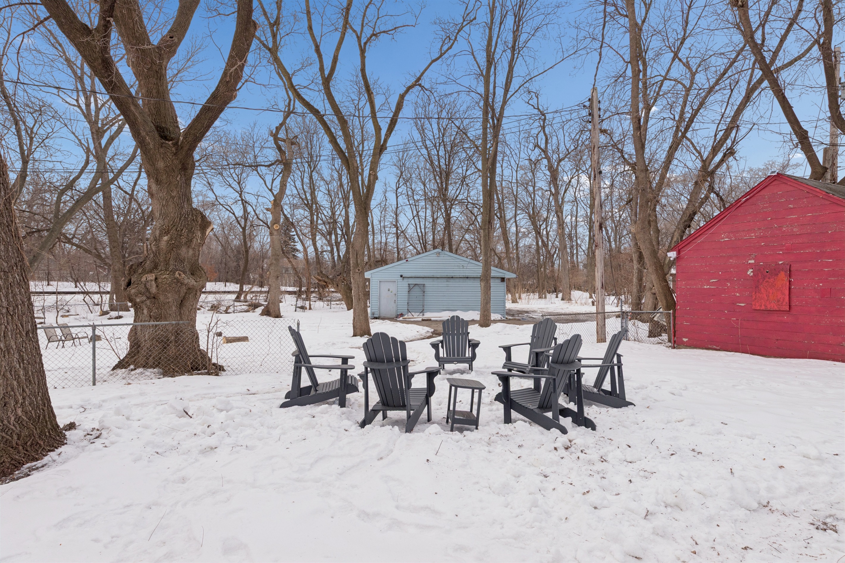 There's a backyard fire pit and Adirondack chairs for evenings under the trees.