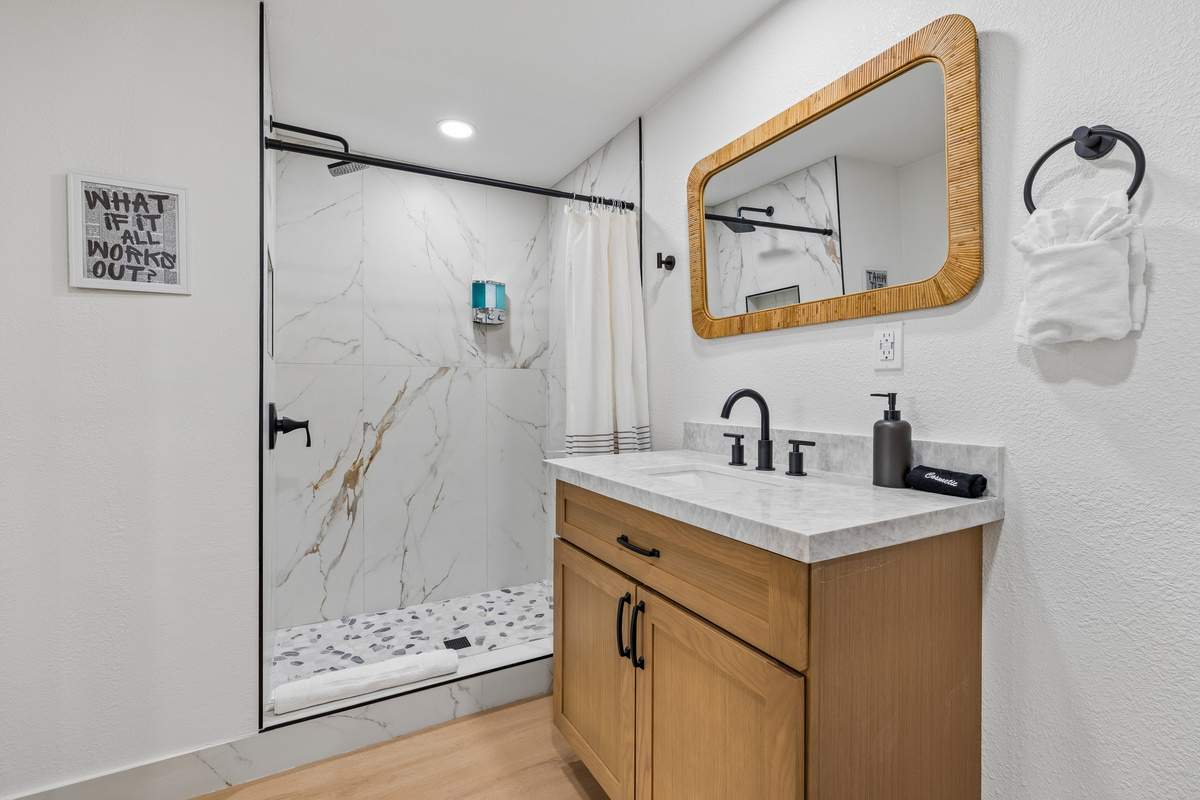 Freshen up before that big meeting in this updated and spacious bathroom