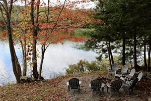 Camp fire view in the fall at the lake house