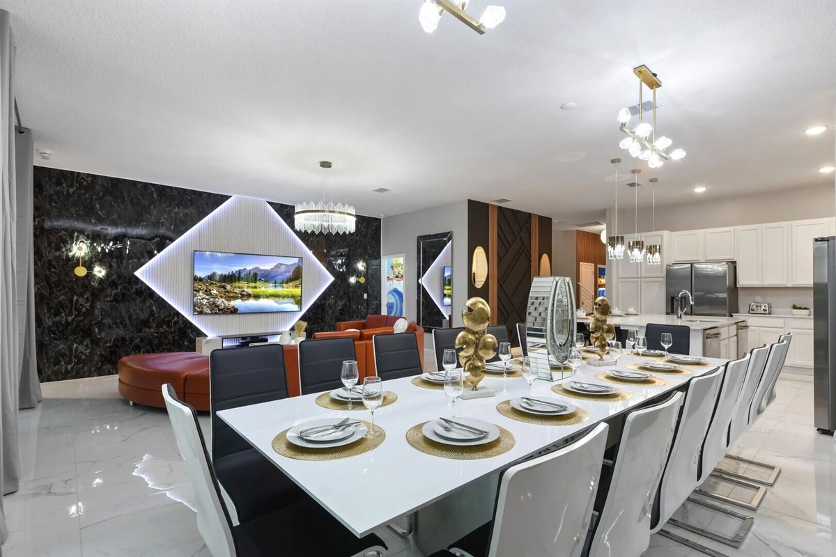 Seamless elegance: An expansive open-concept living, dining, and kitchen space designed for ultimate comfort and style