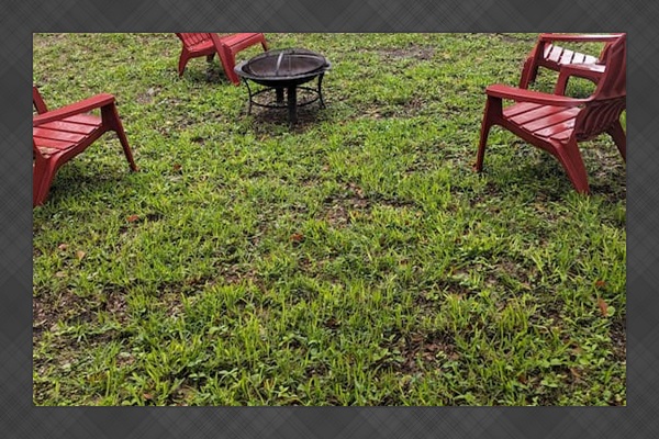 Backyard with seating and a firepit
