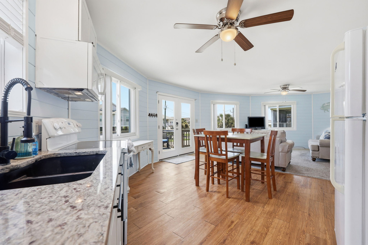 The kitchen and dining area flow seamlessly together