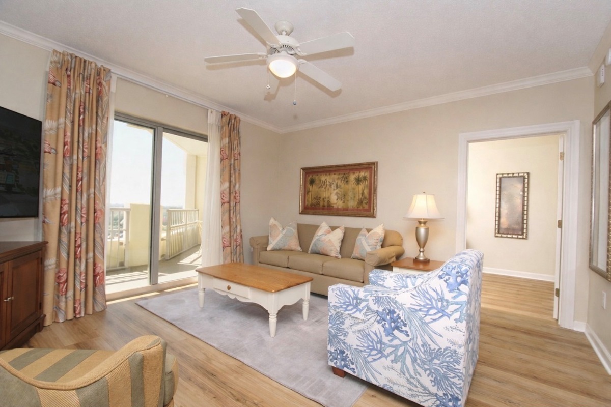 Living Room with balcony access and new sofa