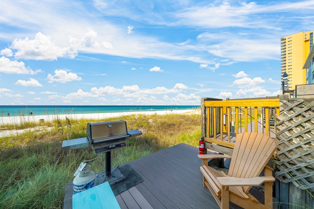Swim, sun, or stroll: enjoy the shared beachfront pool, sundeck, outdoor shower, and private boardwalk to the sand — plus a shared grill for those perfect cookout nights.