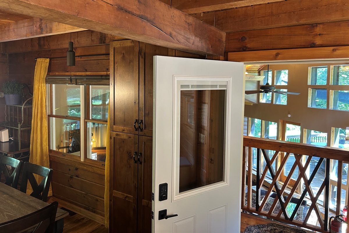 View from Cabin kitchen door into Sunroom.