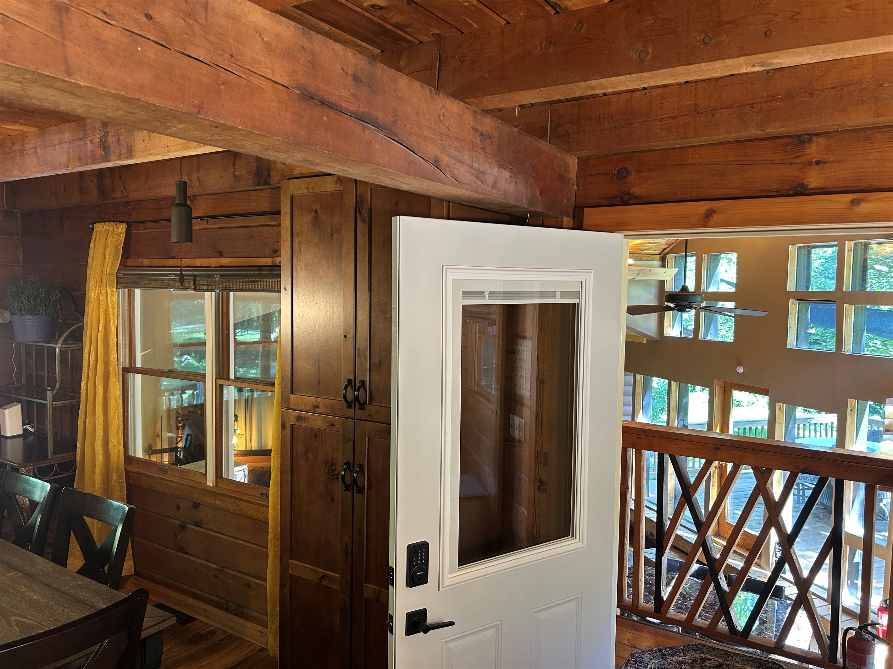 View from Cabin kitchen door into Sunroom.