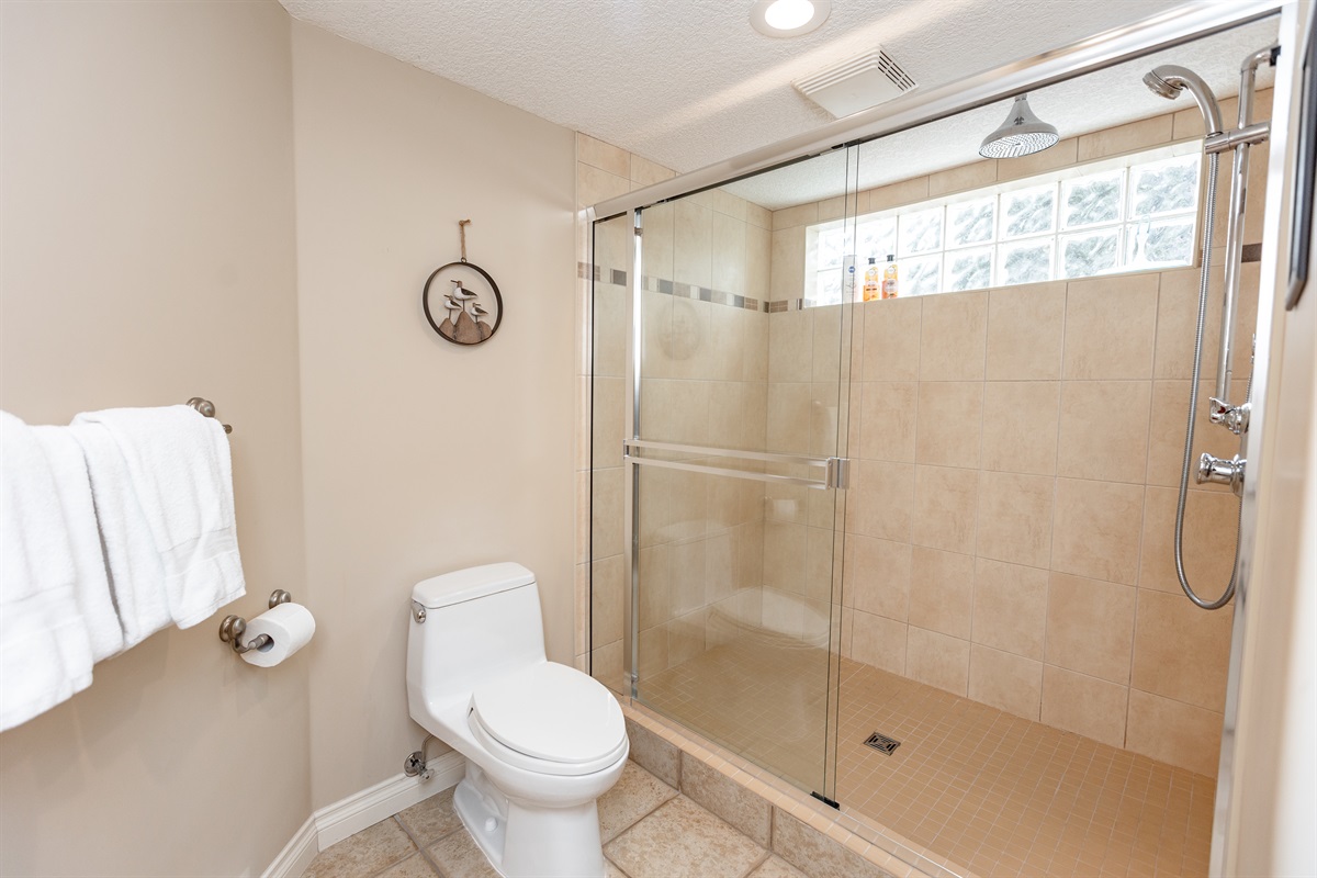 Unit B. Oversized Rain shower! Super large bathroom. Easy to move around.
