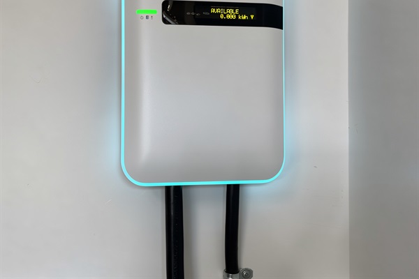 {Garage} Level 2 EV charger available during your stay.