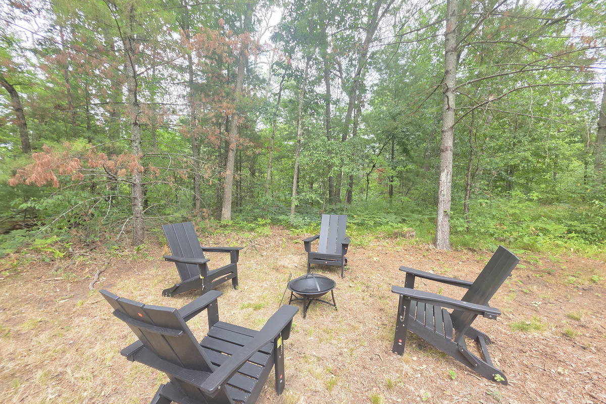 Fire pit with Adirondack chairs