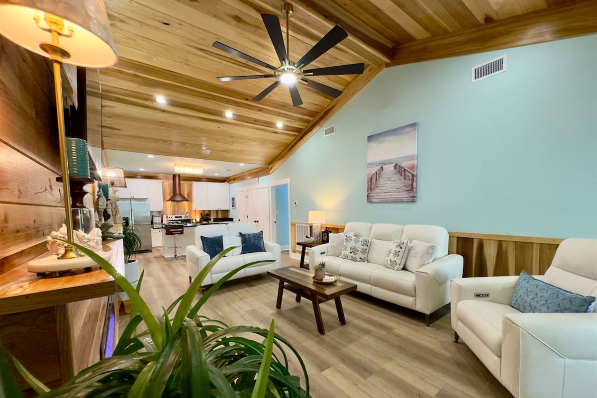 Be invited to relax in this open, cheerful living area.