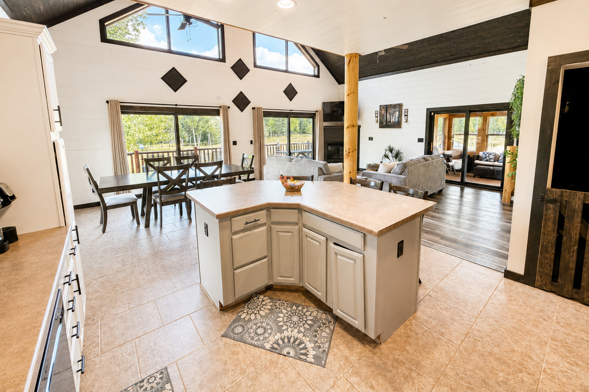 Open kitchen and dining area keeps everyone connected, with plenty of space for group meals, conversation and time together.
