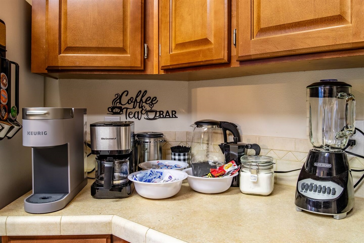 Caffee and Tea Station equipped with a Keurig appliance, drip coffee maker, and French press coffee maker.