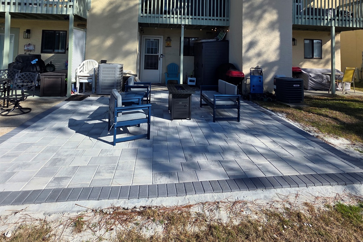 View of New Patio with New Patio Furniture looking towards the back of the Townhouse. Big spacious area to grill and chill.