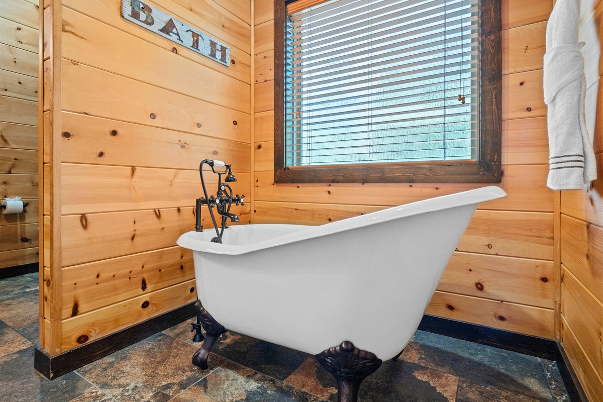 Freestanding soaking tub perfect for unwinding after a long day.