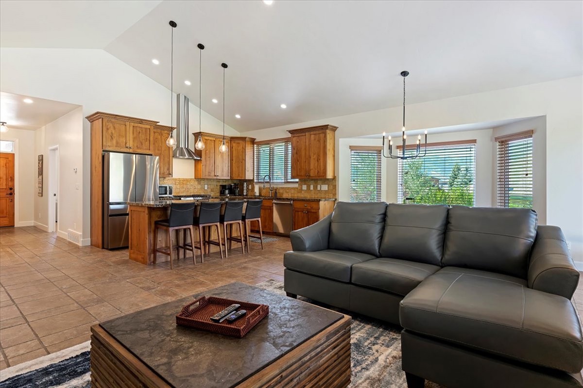 Gather, cook, and connect in this open-concept space where the kitchen flows seamlessly into a cozy living area—perfect for making memories together.