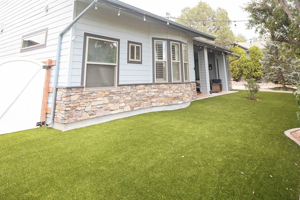 Artificial grass landscape just off the patio leading up to the golf course
