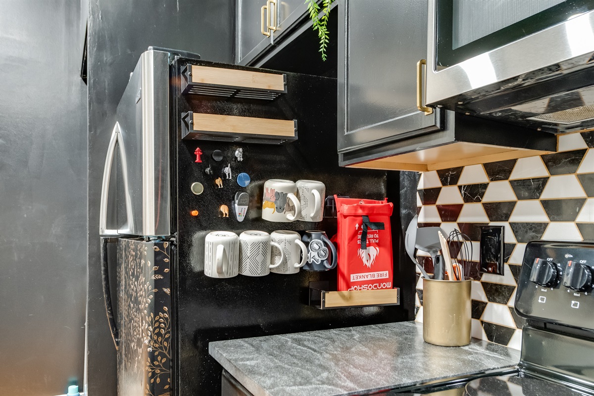 Kitchen Delight: Stylish, well-equipped kitchen with elegant accents and fun decor awaits culinary adventures!