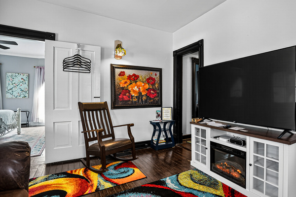 Catch a game, the races, or your favorite flick or show on the 65" Roku TV. If you're chilly, enjoy the electric fireplace and a soft, comfy throw.