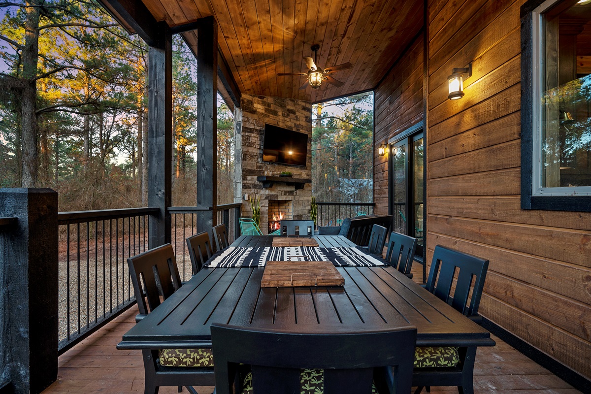 Enjoy meals together outdoors with spacious seating for eight under the open sky.