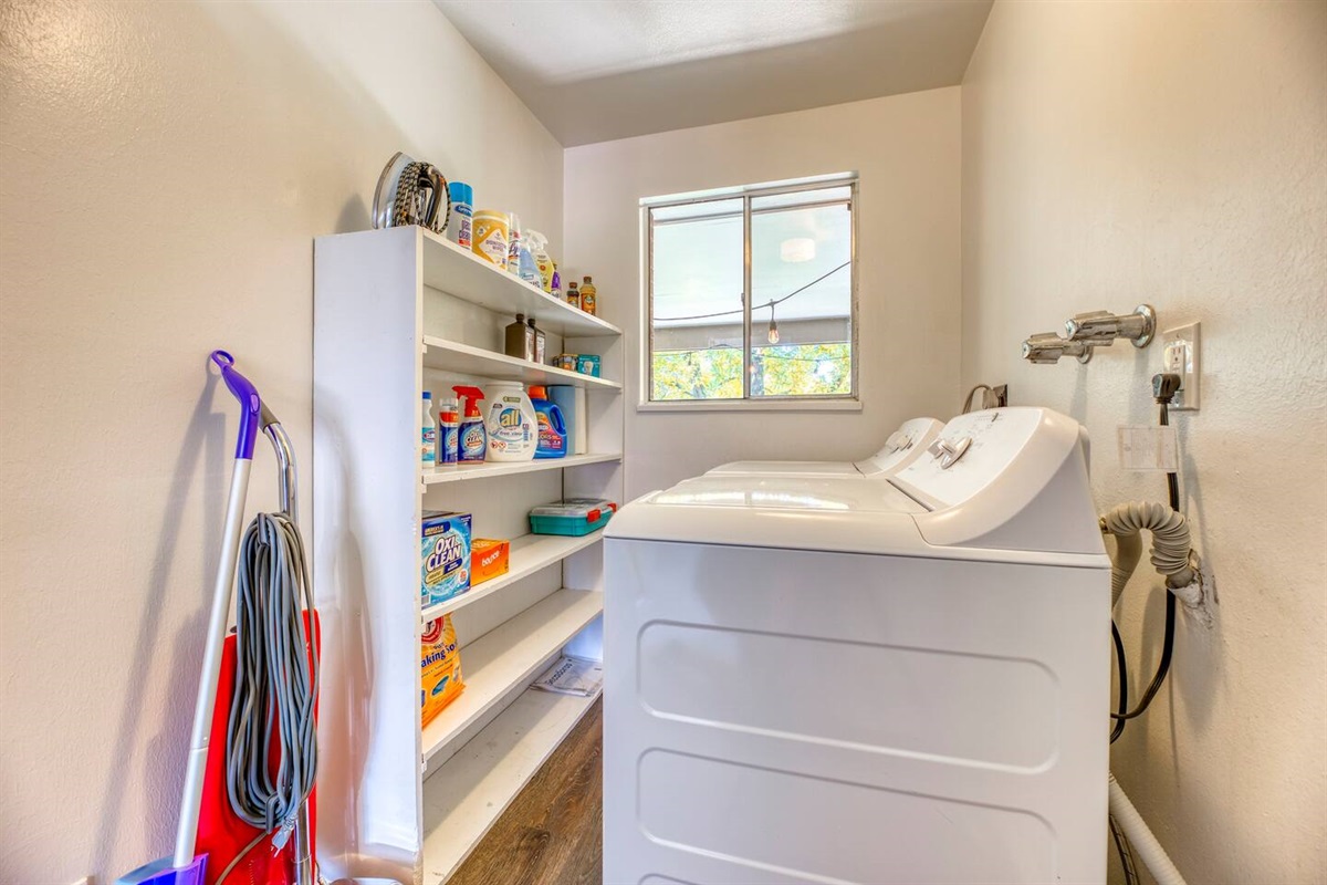 Private Laundry room with starter supplies.