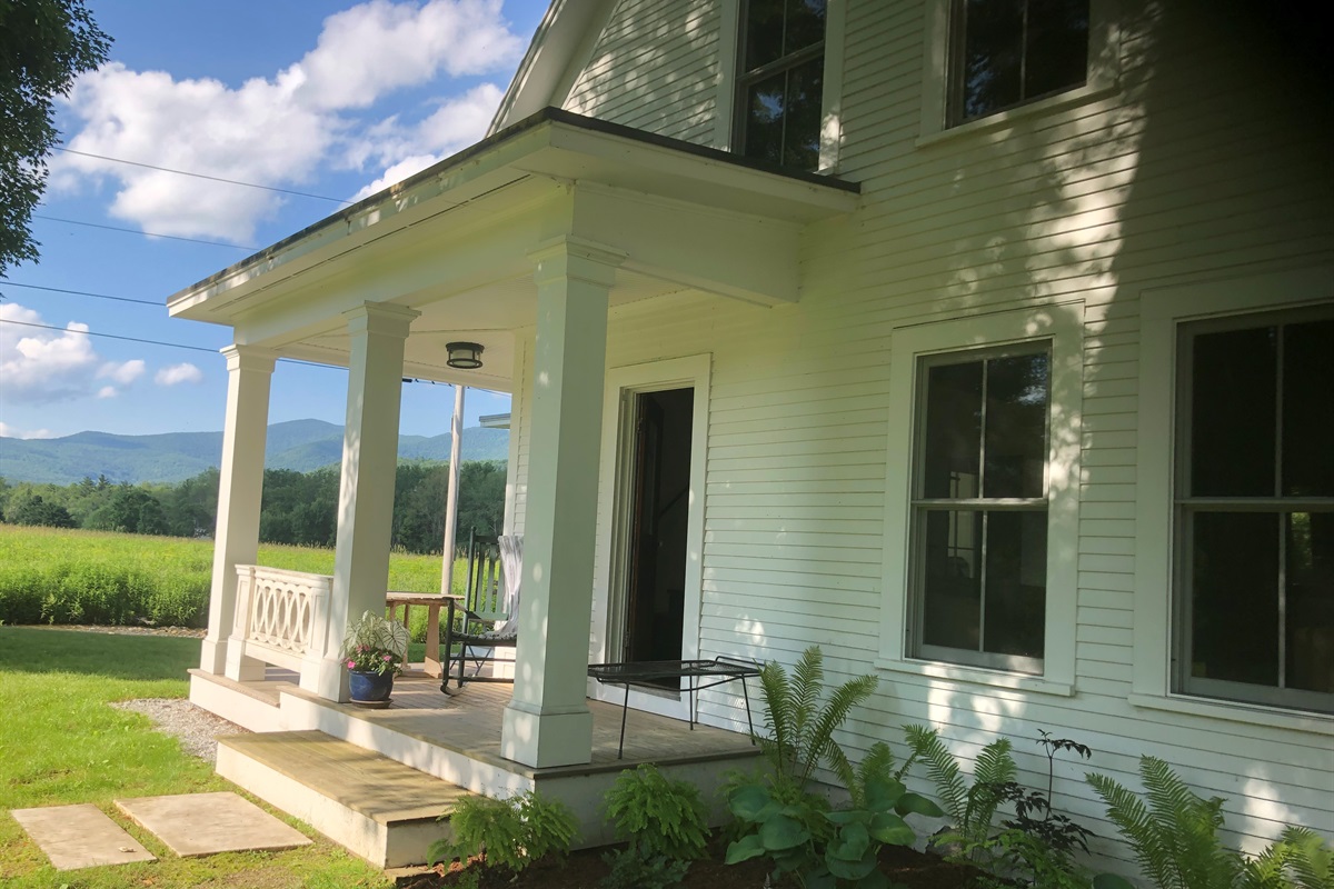 Front Porch Details

“Inviting front porch with seating — a perfect place to unwind and take in the scenery.”