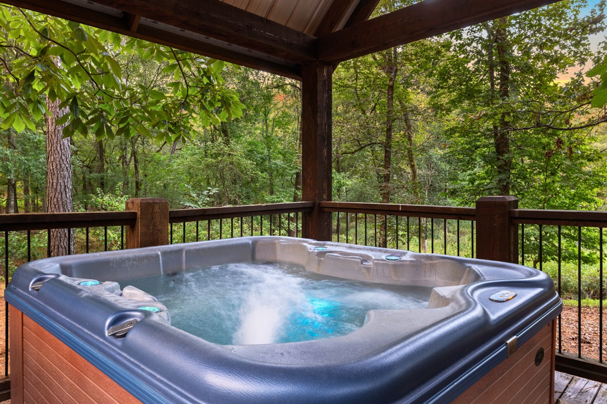 Soak in the deck hot tub while surrounded by the forest. The ultimate way to reconnect and recharge.