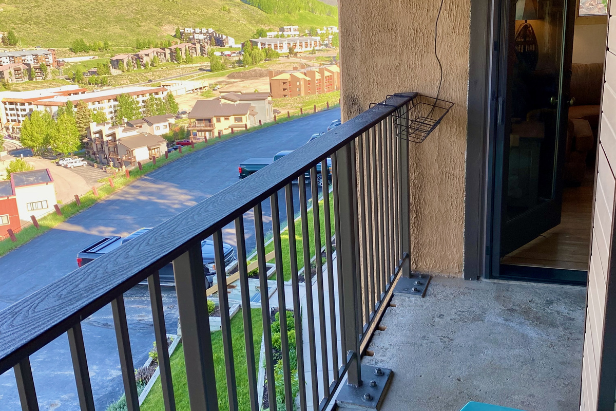Covered deck off living area-  view of chairlifts, base area, Mt. Crested Butte, Mt. Snodgrass 