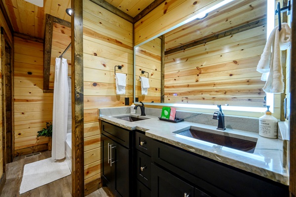 Bright, modern, and refreshing—this ensuite bathroom features a spacious walk-in shower, sleek finishes, and everything you need to unwind in comfort