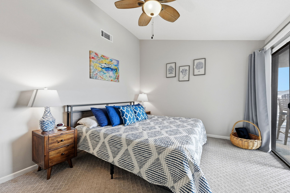 Sweet dreams start here in this inviting king bedroom with access to the oceanfront balcony