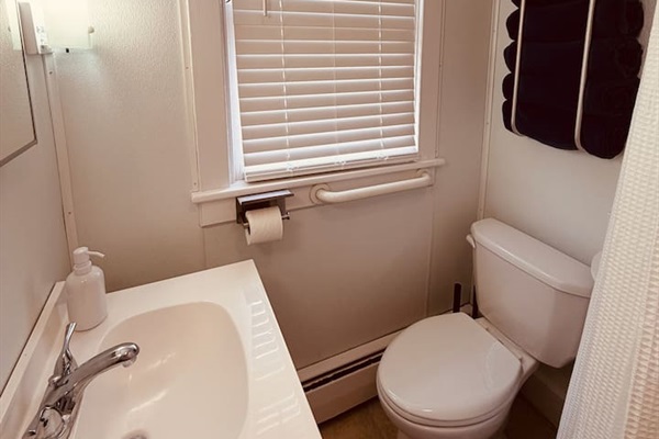 Deep clawfoot tub/shower combo — great for soaking after a long walk (note: tub wall requires a step up).”