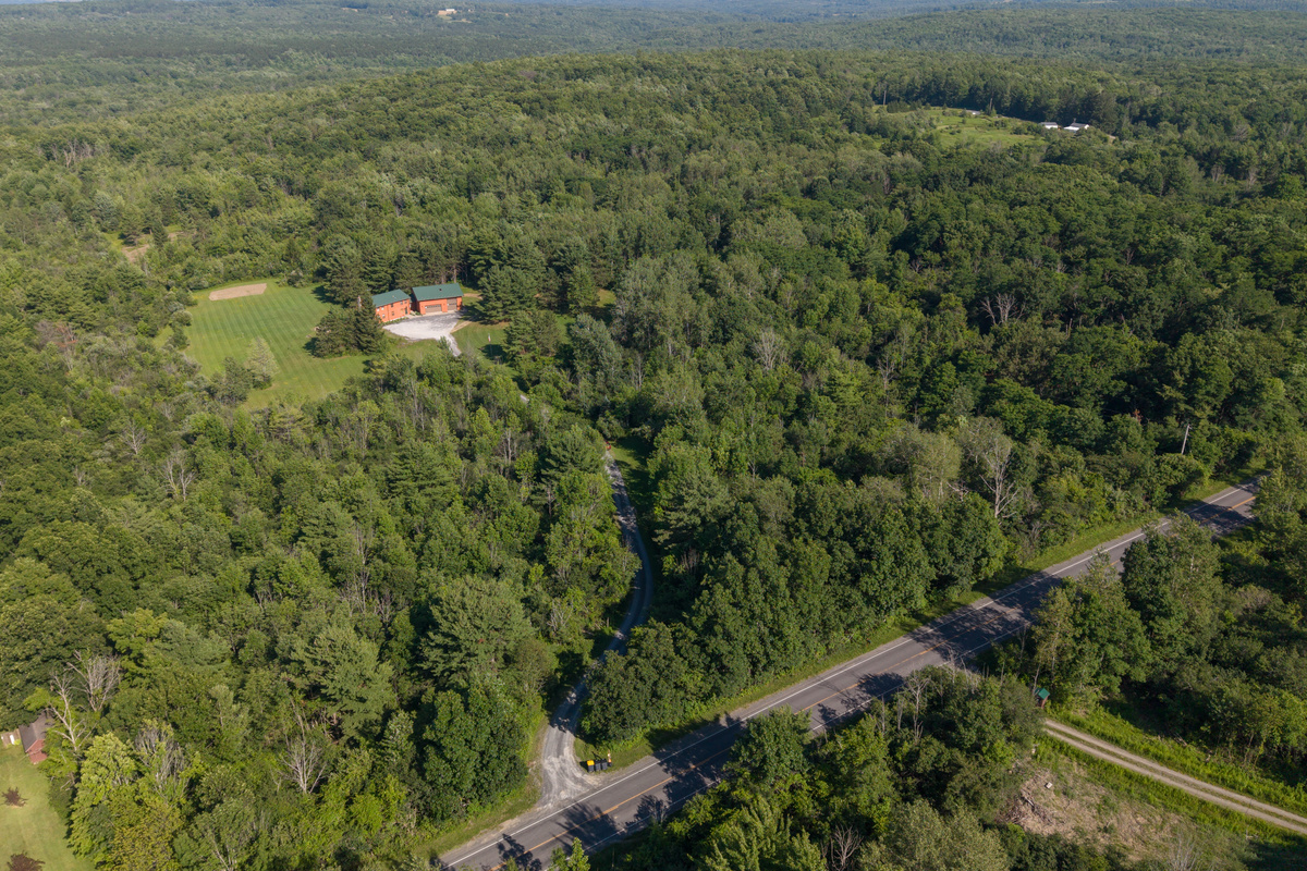 Aerial view of the wooded property