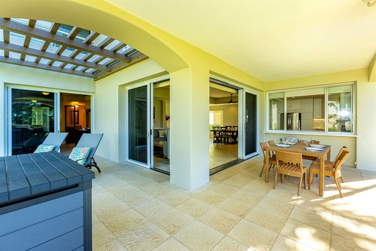 The 400 sq ft large lanai wraps around the living room. You have two chaise lounges, dining seating for six and a beach gear storage unit (contains beach chairs, boogie boards and a cooler)