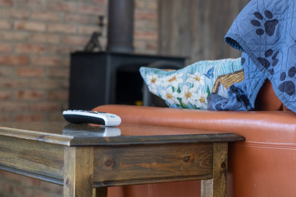 Rustic wood stove to warm up the cozy living area.
