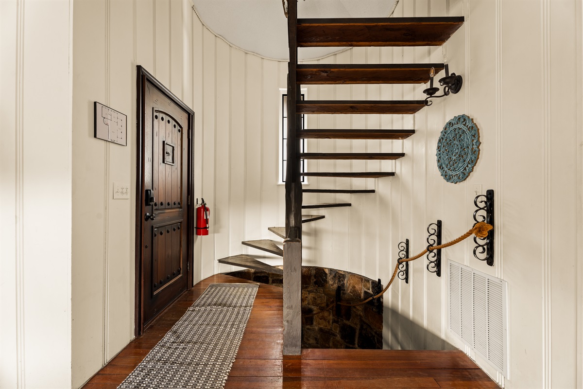 A grand entrance with a staircase made for exploration