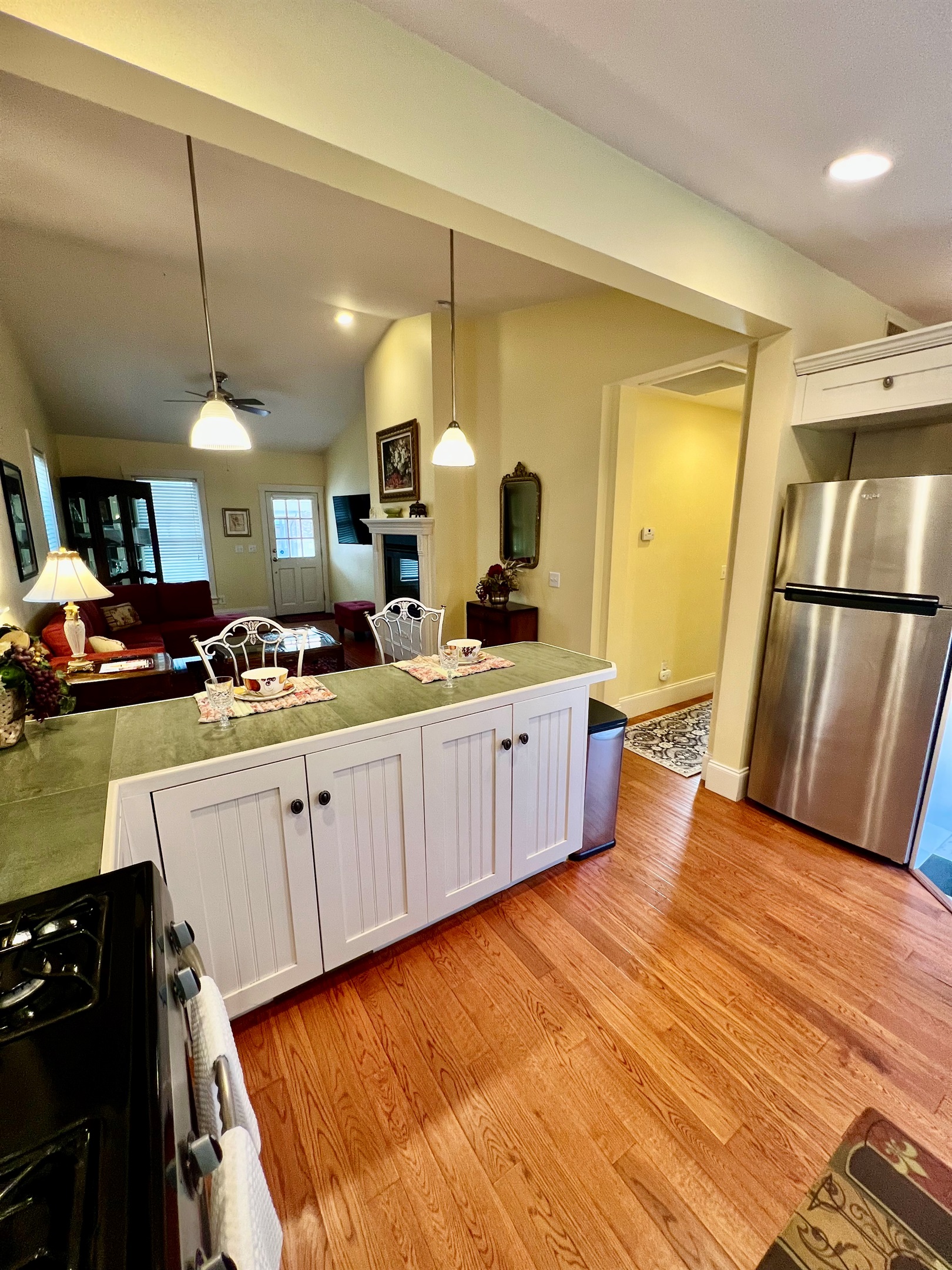 "Never miss a moment of the fun—prep dinner while staying connected with your guests in this seamless open-concept space."