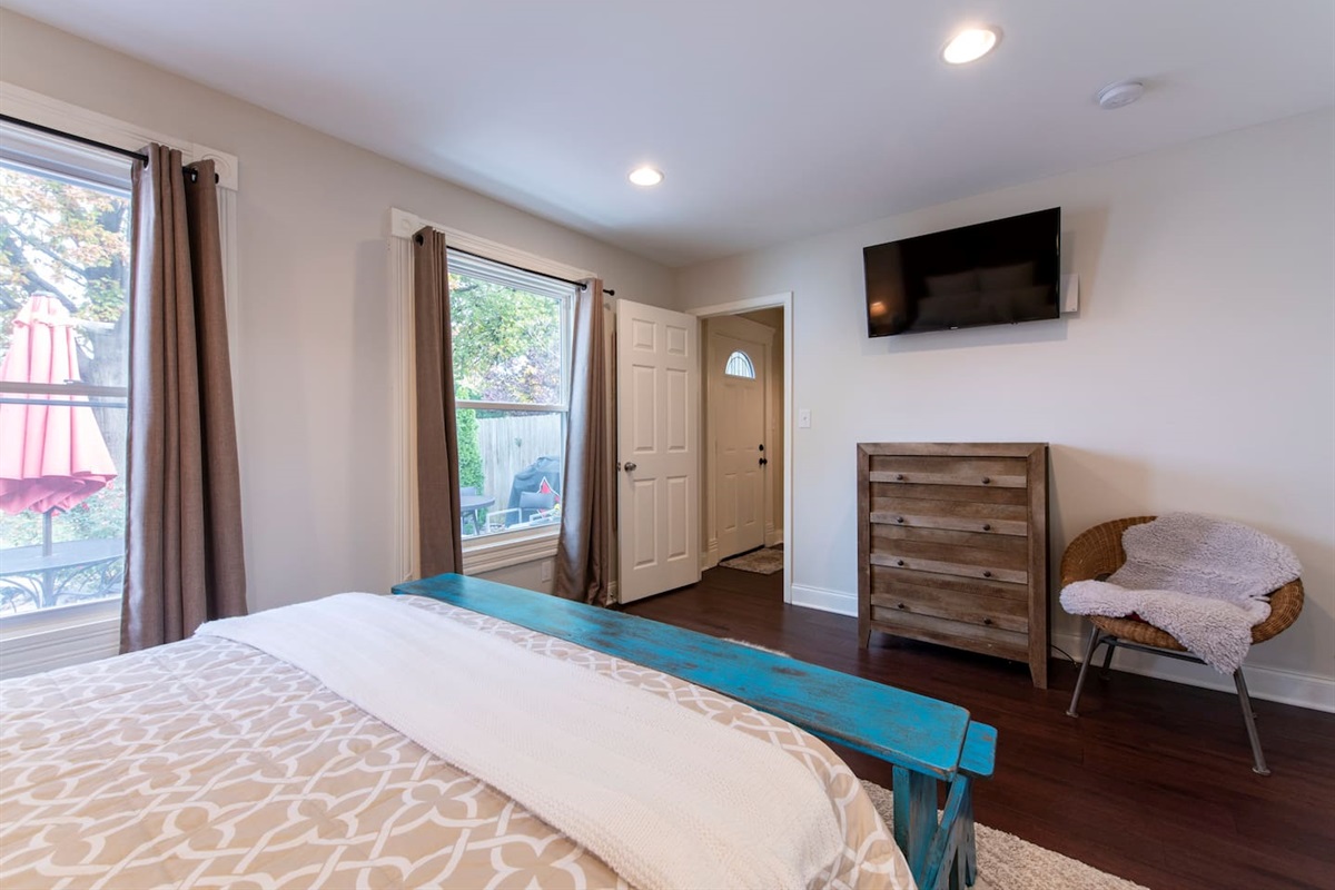 Master bedroom with TV and dresser
